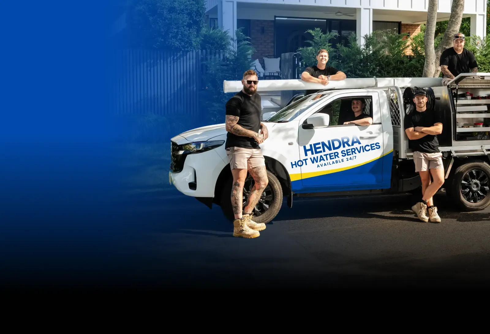 Hendra Hot Water Services team with the ute